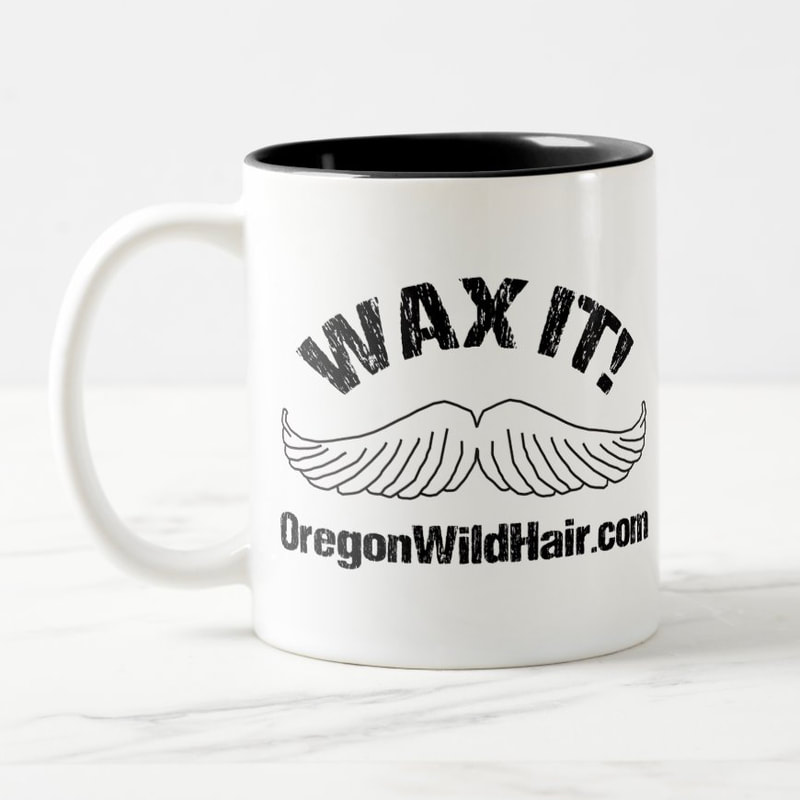 A coffee mug printed with printed with a moustache and the slogan Wax It!