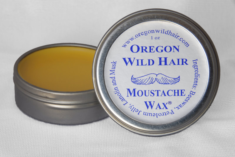 A tin of original formula moustache wax.
